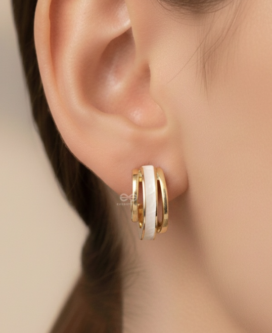 A CLASSY DAME - WHITE ENAMELLED GOLDEN STUDS