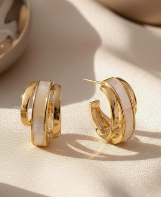 A CLASSY DAME - WHITE ENAMELLED GOLDEN STUDS